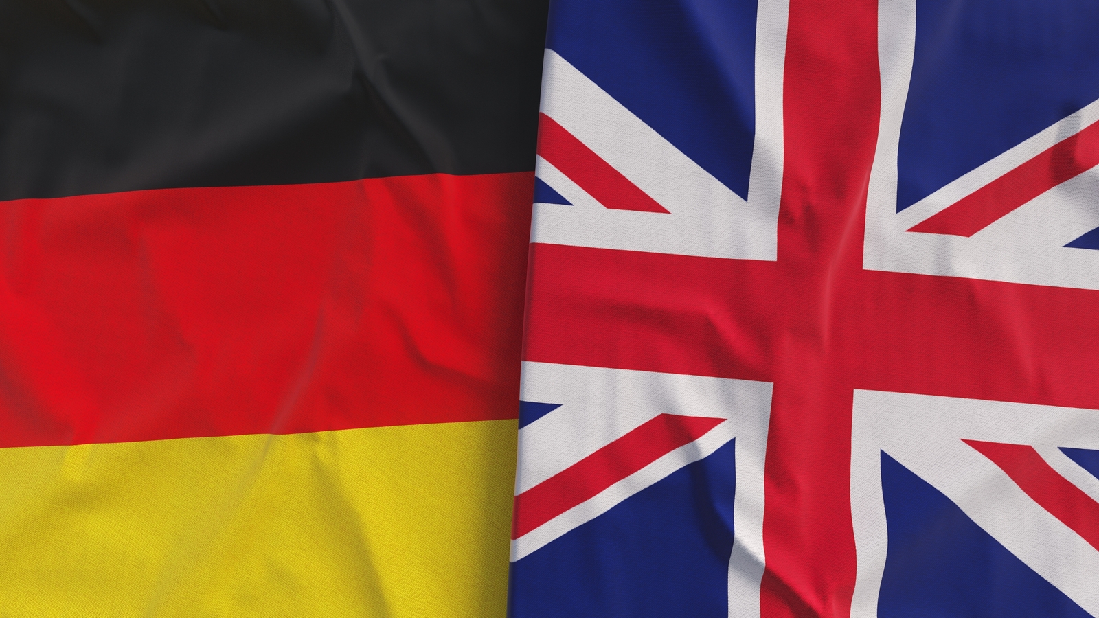 Flags,Of,Germany,And,The,United,Kingdom.,Linen,Flags,Close-up. Uk Germania Cyberattacchi